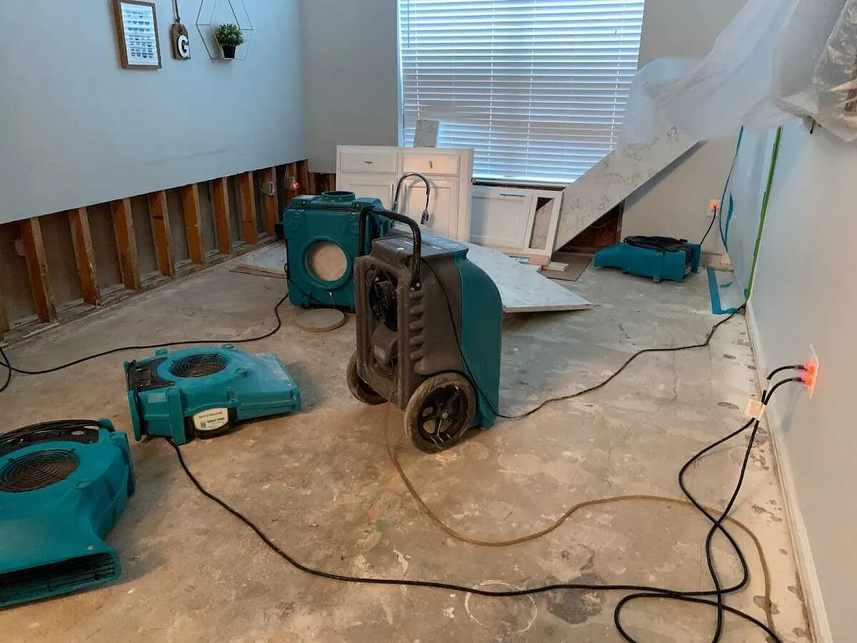 Dehumidifier in flood-cut room for Water Damage Restoration in Rogersville